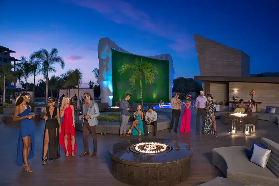 Masquerade party near the freestyle pool