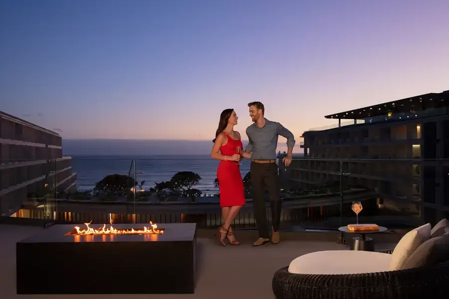Couple enjoying the evening on the moon deck