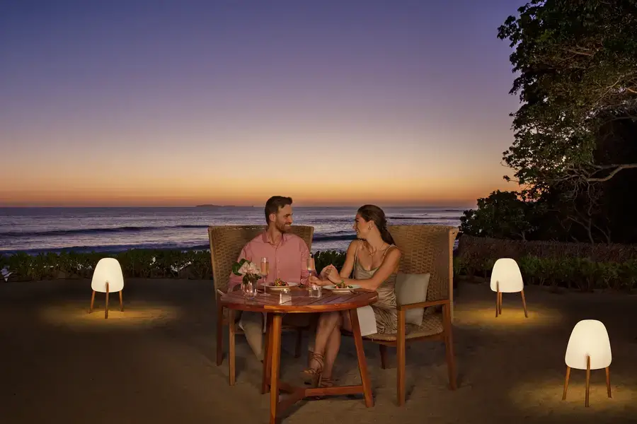 Romantic couples dinner on the beach