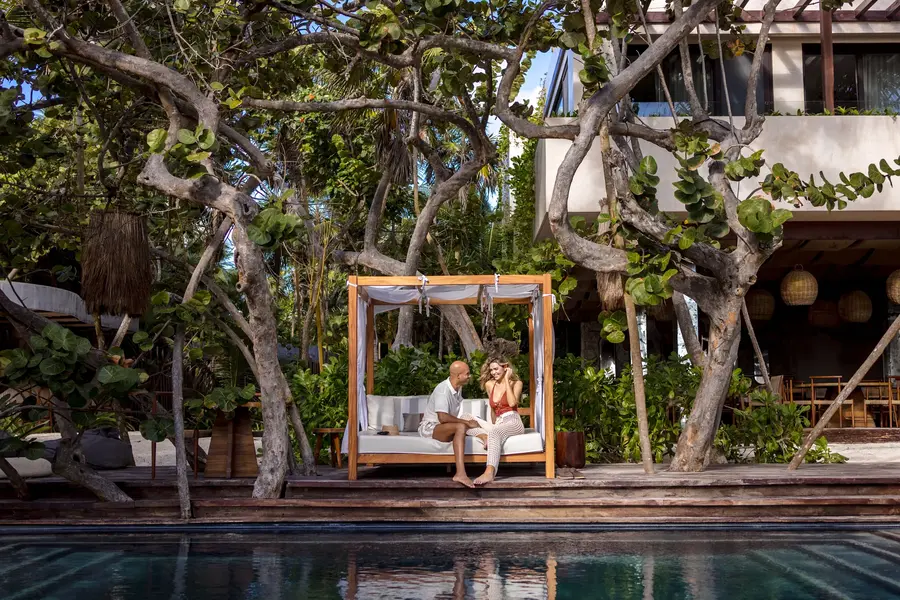 Couple on beach club lounge