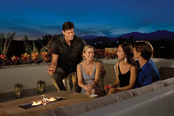 Two couples at the fire pit
