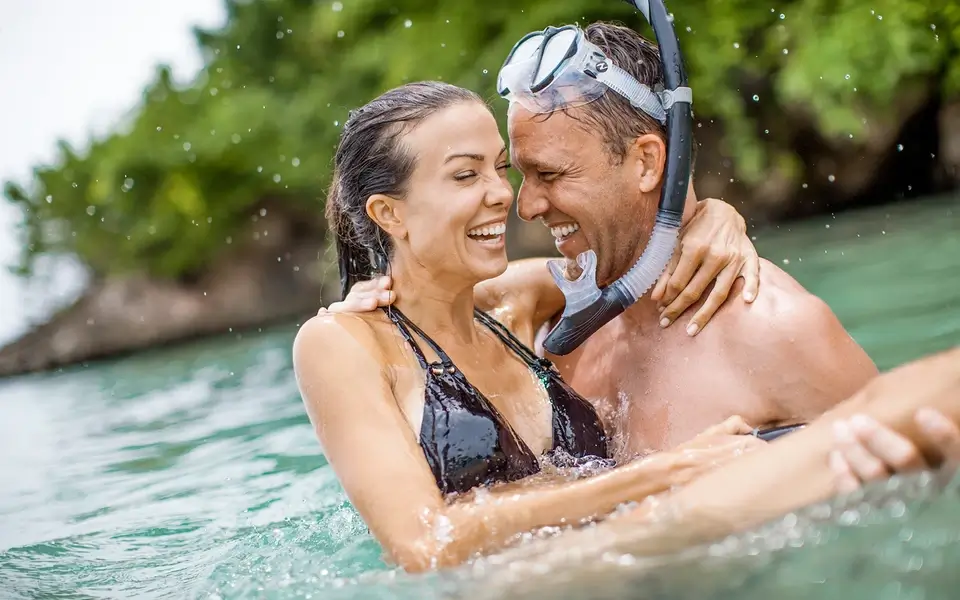 Couple having fun snorkeling